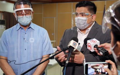 <p><strong>ANTI-FIXERS DRIVE</strong>. Anti-Red Tape Authority Director-General Jeremiah Belgica and Land Transportation Office Assistant Secretary Edgar Galvante grant a media interview after their meeting at the LTO office in Quezon City on Wednesday (June 23, 2021). The two officials vowed to work together to bolster anti-fixers campaign. <em>(Photo by Jess Escaros)</em></p>