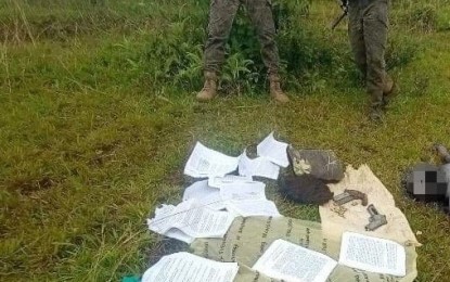 <p><strong>SEIZED ITEMS</strong>. Troops of the Philippine Army’s 79th Infantry Battalion recover two firearms along with subversive documents after an encounter with New People’s Army rebels in Barangay Minapasuk, Calatrava, Negros Occidental on Tuesday (June 22, 2021). The clash claimed the life of a member of NPA’s hit squad Special Partisan Unit. <em>(Photo courtesy of 79th Infantry Battalion, Philippine Army)</em></p>