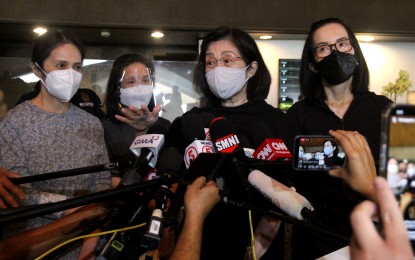 <p><strong>PNOY'S KIN.</strong> Pinky Abellada (3rd from left) confirms the death of her younger brother, former president Benigno “Noynoy” Aquino III, in an impromptu press briefing at the Heritage Memorial Park in Taguig City on Thursday (June 24, 2021). Their other sisters (from left) Ballsy Cruz, Viel Dee, and Kris Aquino also faced the media but left the announcement to Abellada.<em> (PNA photo by Rico H. Borja)</em></p>