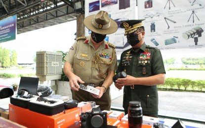 <p><strong>DONATION.</strong> AFP chief, Gen. Cirilito Sobejana (right) and Australian Defense Attaché, Col. Paul Joseph Barta (left), take a look at the IT and multimedia equipment donated by the Australian government in Camp Aguinaldo, Quezon City on Wednesday (June 23, 2021). The donation was coursed under the mutually agreed Australia-Philippines Enhanced Defence Cooperation Program. <em>(Photo courtesy of AFP Public Affairs Office)</em></p>