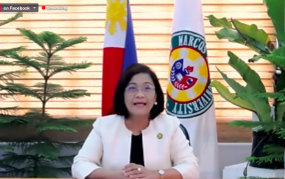 <p><strong>SMART CAMPUS. </strong>Dr. Shirley Agrupis, president of the Mariano Marcos State University, presents in a virtual presscon on Thursday (June 24, 2021) about the university's smart campus project. In support of this, the Commission on Higher Education granted MMSU a total of PHP24.9 million to boost its Information Technology infrastructure highway. (<em>Screenshot from CHED's virtual presscon</em>) </p>