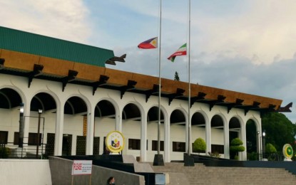 <p><strong>RESPECT AND SYMPATHY.</strong> The Philippine flag, together with the BARMM emblem, were both flown at half-mast since Thursday (June 24, 2021) at the BARMM compound in Cotabato City to mourn and sympathize with the country on the passing of former President Benigno Simeon C. Aquino III. The former president succumbed to renal disease secondary to diabetes at the Capitol Medical Center in Quezon City. <em>(Photo courtesy of Myrna Jocelyn Henry – READi – BARMM)</em></p>