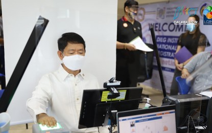 <p><strong>REGISTERED.</strong> Department of the Interior and Local Government Secretary Eduardo Año registers his biometrics for the national ID at the agency head office in Quezon City on June 23, 2021. The ID shall be a valid proof of identity and a means of simplifying public and private transactions, enrollment in schools, and opening of bank accounts. <em>(Photo courtesy of DILG)</em></p>