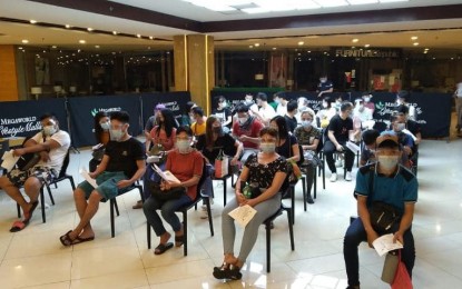 <p><strong>PROTOCOL.</strong> Manila residents line up for vaccines at a mall on June 23, 2021. Safety protocols like physical distancing and wearing of masks and face shield help prevent the spread of Covid-19. <em>(Photo courtesy of Manila-PIO)</em></p>