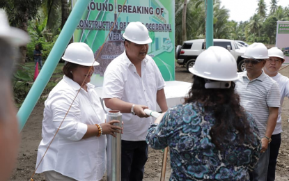 <p><strong>UPGRADED.</strong> Davao Occidental Rep. Lorna Bautista-Bandigan (left) and Gov. Claude Bautista (2nd from left) prepare to lower the time capsule of the proposed general hospital in Malita, Davao Occidental in this photo taken in July 2018. It is expected to be operational by January 2022. <em>(Photo courtesy of Marivic F. Hubac)</em></p>
