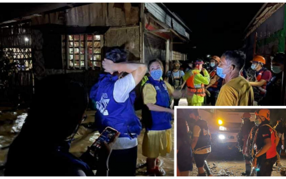 <p><strong>RESCUE EFFORTS.</strong> Disaster workers of Bagumbayan, Sultan Kudarat help rescue residents trapped by rampaging floodwaters on Sunday night (June 27, 2021) night following a daylong heavy downpour that submerged the village of Dagoma in the area. Some 800 families from the village were evacuated to safer grounds by rescue workers as chest-deep waters submerged several low-lying sitios of the village. <em>(Photo courtesy of Lovely Joy Hallegado, SK PDRRMO)</em></p>