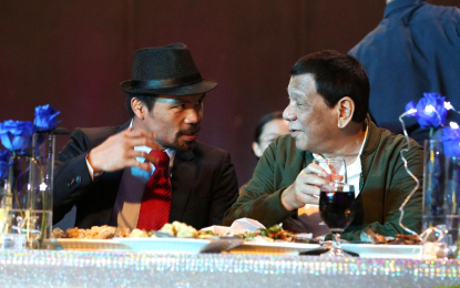 <p><strong>COMPLETE SURPRISE.</strong> President Rodrigo Roa Duterte chats with Senator Emmanuel Pacquiao during the Senator's birthday celebration at the KCC Convention and Events Center in General Santos City on Dec. 17, 2018. Malacañang on Tuesday (June 29, 2021) said Duterte was “completely surprised” about Pacquiao’s fresh claim that corruption exacerbates under his watch. <em>(Presidential photo)</em></p>