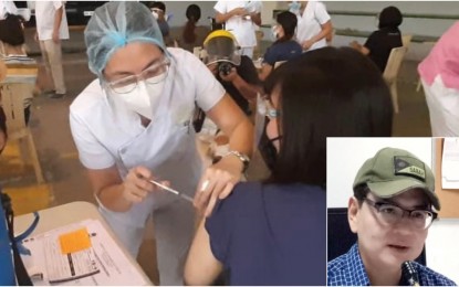 <p><strong>RISING DEMAND FOR VAX.</strong> A nurse is seen administering a vaccine jab to a medical front-liner at the start of the vaccination rollout in March 2021. Cebu City Project Vaccine Storm deputy lead convenor Erik Miguel Espina (inset) on Wednesday (June 30, 2021) noted a rising demand for vaccines as the city temporarily stopped the inoculation while waiting for more supplies from the Department of Health. <em>(PNA file photo by John Rey Saavedra)</em></p>