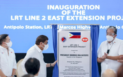 <p><strong>LRT-2 EAST EXTENSION.</strong> President Rodrigo Roa Duterte leads the unveiling of the Light Rail Transit (LRT) Line 2 East Extension marker during the inauguration of the newly built LRT Line 2 Station in Antipolo City, Rizal on Thursday (July 1, 2021).  The extension will have two more LRT 2 stations— Marikina-Pasig and Antipolo – that will increase the line’s daily capacity by 80,000 passengers. <em>(Presidential photo by Ace Morandante)</em></p>