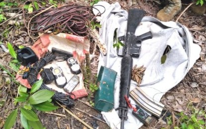 <p><strong>WAR MATERIALS.</strong> Government troops discover an arms cache in Besao, Mountain Province on Thursday (July 1, 2021). Police Regional Office Cordillera information officer, Capt. Marnie Abellanida, said among those recovered were an M16 rifle, explosives, electrical wires, two-way radios, cellular phone, and other items. (<em>Photo courtesy of PROCor PIO</em>) </p>