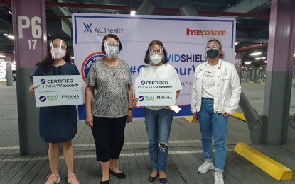 <p><strong>PHINMAVax.</strong> PHINMA employees receive their first dose of coronavirus disease 2019 (Covid-19) vaccine on July 5, 2021 at BGC Parkade. PHINMA procured a total of 26,000 doses of Covid-19 jabs. <em>(Photo courtesy of PHINMA Group)</em></p>