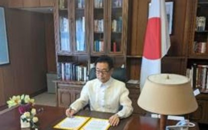 <p><strong>COVID-19 RESPONSE AID</strong>. Japanese Ambassador to the Philippines Koshikawa Kazuhiko signs the exchange of notes for the implementation of the Programme for Covid-19 Crisis Response Emergency Support. The 687-million-yen grant aid will be implemented throughout the Philippines with the provision of cold chain transport and ancillaries. <em>(Photo courtesy of Japanese Embassy in Manila)</em></p>