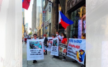 <p><strong>END TERRORISM.</strong> The group Filipino-Americans Against Crime and Terrorism stages a demonstration in front of the Philippine Consulate General in New York on July 5. FACT warned against front organizations undermining the Philippine government and generating funds through donations in the US. <em>(Contributed photo)</em></p>