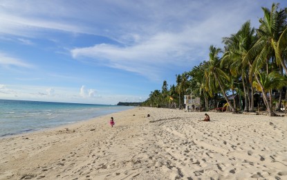 <p style="font-weight: 400;"><strong>SAFE HERE.</strong> Boracay gets a World Travel and Tourism Council Safe Travels Stamp for destinations, formally awarded by the DOT on Wednesday (July 8, 2021). The resort island is known for its long stretch of white sand beach.<em> (Photo by DOT Philippines/Denison Manuel)</em></p>