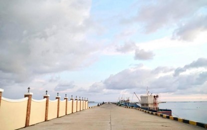 <p><strong>UPGRADED PORT</strong>.  The Salomague Port in Cabugao, Ilocos Sur is now ready to welcome bigger cruise ships with reinforced concrete (RC) Platform Back-Up Area and RC Pier Extension. Government officials led by DOTr Secretary Arthur Tugade on Thursday (July 8, 2021) grace the inauguration of the project. The upgrading of the seaport would boost tourism in the area. (<em>Photo courtesy of DOTr Secretary Art Tugade Facebook page</em>) </p>