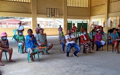 <p><strong>SIGNUP</strong>. Coconut farmers gather at a covered court in Carigara, Leyte for the registration in this April 10, 2021 photo. Only 65 percent of the nearly 350,000 coconut farmers in Eastern Visayas have been registered under the National Coconut Farmer's Registry System as of July 7, 2021 prompting the Philippine Coconut Authority (PCA) to ask farmers to participate in the listing process. <em>(Photo courtesy of PCA)</em></p>