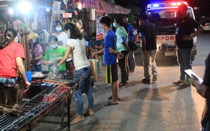 <p><strong>SMALL BUSINESSES</strong>. This undated photo shows health marshals inspecting a 'tocino' (sweet bacon) and barbecue stand in Dumaguete City to ensure minimum health protocols are being followed. Small businesses are the hardest hit by the imposition of a modified enhanced community quarantine in Negros Oriental due to a surge in Covid-19 cases, a business leader in Central Visayas said on Monday (July 12, 2021). <em>(Photo from Lupad Dumaguete/City PIO Facebook page)</em></p>