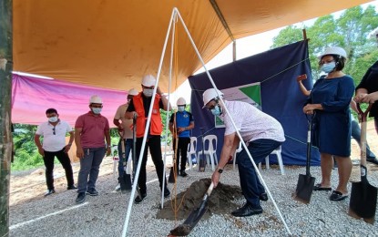 <p><strong>NEW ISOLATION FACILITY</strong>. The first isolation facility funded under the Bayanihan To Recover As One Act in Western Visayas breaks ground in Concepcion, Iloilo on Tuesday (July 13, 2021). The groundbreaking ceremony was led by Office of Civil Defense (OCD) regional director Jose Roberto Nuñez (in orange vest), Concepcion Mayor Raul Banias (in white and shovel), and members of the Regional Incident Management Team of the Regional Disaster Risk Reduction and Management Council (RDRRMC). <em>(Photo courtesy of OCD)</em></p>