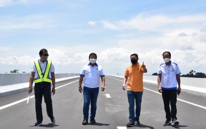 <p><strong>FINAL INSPECTION</strong>. Public Works and Highways Secretary Mark Villar (2nd from right) leads the final inspection of the Central Luzon Link Expressway on Wednesday (July 14, 2021). CLLEX will be opened to motorists on Thursday (July 15, 2021). <em>(Photo courtesy of DPWH)</em></p>