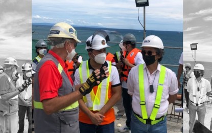 <p><strong>SITE INSPECTION</strong>. Public Works Secretary Mark Villar (center) listens as CCLEC officials brief him on the construction progress of the CCLEX during his ocular inspection at the site on Friday (July 16, 2021). Villar announced that an upgraded national highway system in Mactan Island will be ready to complement the opening of the PHP30-billion toll bridge by next year.<em> (PNA photo by Carlo Lorenciana)</em></p>