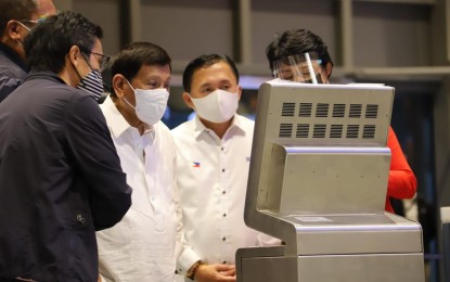 <p><strong>INSPECTION</strong>. President Rodrigo Duterte and Senator Christopher Lawrence "Bong" Go lead the inspection of the newly completed Clark International Airport New Passenger Terminal Building in Pampanga on Saturday (July 17, 2021). The new facility, once operational, is seen to equip Northern and Central Luzon with the transportation infrastructure for future development. <em>(Photo courtesy of BCDA)</em></p>