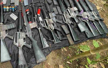 <p><strong>RECOVERED</strong>. Photo shows the 12 high-powered firearms recovered after a clash between the New People’s Army (NPA) and government troops in Barangay Bongalon, Sagñay, Camarines Sur on Monday (July 19, 2021). Maj. Gen. Henry Robinson Jr., commander of Joint Task Force Bicolandia, lauded the troops for landing another big blow on the communist terrorist group's already waning capability both in firepower and manpower.<em> (Photo courtesy of 9th Infantry Division, PA)</em></p>