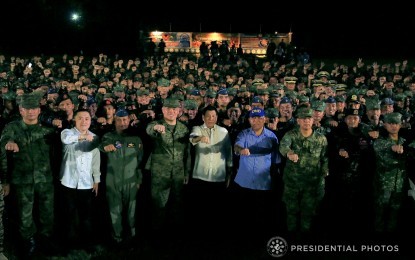 <p><strong>SUPPORT FOR AFP</strong>. President Rodrigo Roa Duterte makes a “fist bump” with soldiers in this undated photo. Duterte's strong support to the Armed Forces of the Philippines (AFP) has always been considered as part of his administration's legacies.<em> (Presidential photo)</em></p>