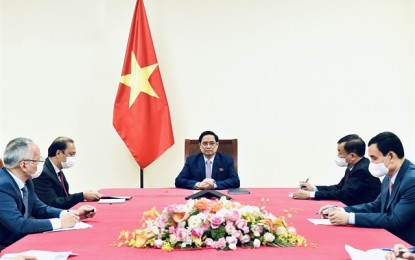 <p><strong>TRUSTWORTHY PARTNER</strong>. Vietnamese Prime Minister Phạm Minh Chính (center) talks with Philippine President Rodrigo Duterte over the phone late Monday (July 19, 2021). Chính affirmed that the Philippines is always an important and trustworthy partner that shares many concerns and strategic interests with Vietnam. <em>(VNS photo)</em></p>