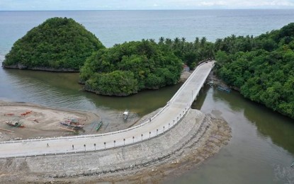 <p><strong>LINK</strong>. The 75-meter bridge connecting two areas in Barangay Nauhang, Sipalay City, Negros Occidental. It now allows tourists to reach Sugar Beach Resort and Langub Beach Resort in the village without riding a boat. <em>(Photo courtesy of DPWH Negros Occidental 3rd District Engineer's Office)</em></p>