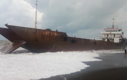 <p><strong>STUCK</strong>. Barge ASC Lara is stranded in Barangay Oloc, Laua-an in northern Antique. The barge that first ran aground in Barangay Ilaures, Bugasong was again met by strong winds and big waves while being towed towards the municipality of Pandan. <em>(Photo courtesy of PCG Antique)</em></p>