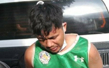 <p><strong>RECAPTURED</strong>. Francisco Epogon, believed to be a leader of the notorious Epogon robbery group in Negros Occidental, was arrested by joint police and jail operatives in Binalbagan town on Friday (July 23, 2021). He was among the five inmates who bolted the Negros Occidental District Jail in Bago City on June 29, 2021. <em>(Photo courtesy of Negros Occidental Police Provincial Office)</em></p>