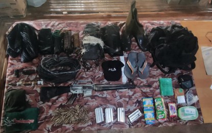 <p><strong>RECOVERED.</strong> Firearm and ammunition, and improvised explosive device components as well as personal items recovered by troops of the Philippine Army’s 94th Infantry Battalion from a New People’s Army hideout in Sitio Buko, Barangay Tan-awan in Kabankalan City on Thursday (July 22, 2021). It was the second lair of the communist-terrorists discovered by soldiers in southern Negros this week.<em> (Photo courtesy of 3rd Infantry Division, Philippine Army)</em></p>