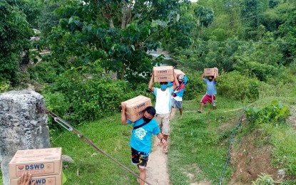 <p><strong>RELIEF PACKS.</strong> The Department of Social Welfare and Development-Western Visayas sends family food packs to indigenous peoples’ communities in Antique province in this May 2021 photo. The agency will also lead the distribution of cash assistance to areas under enhanced community quarantine in Visayas and Mindanao.<em> (Photo courtesy of DSWD-6)</em></p>