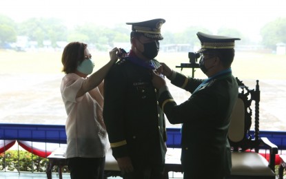 <p><strong>RETIREMENT RITES.</strong> AFP chief, Gen. Cirilito Sobejana leads the change-of-command and retirement ceremony for Lt. Gen. Antonio Parlade Jr. (center) at the Southern Luzon Command headquarters in Lucena City, Quezon on Sunday (July 25, 2021). Parlade was replaced as Solcom commander by Maj. Gen. Bartolome Vicente Bacarro. <em>(Photo courtesy of AFP)</em></p>