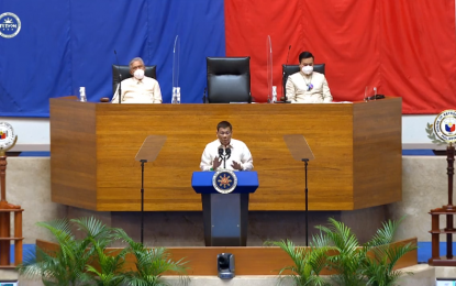 <p style="text-align: justify;"><strong>FINAL SONA.</strong> President Rodrigo Duterte delivers his sixth and final State of the Nation Address on Monday (July 26, 2021). Duterte vowed to continue to push for landmark reforms until the last day of his term. <em>(Screengrab from RTVM FB page)</em></p>