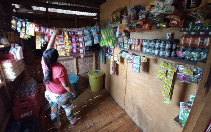 <p><strong>LIFE AFTER ARMED STRUGGLE</strong>. Photo shows Maria, a former rebel, tending to her 'sari-sari' store financed through the Livelihood Settlement Grant of the Sustainable Livelihood Program of the National Task Force to End Local Communist Armed Conflict (NTF-ELCAC) and rolled out through the Department of Social Welfare and Development. Secretary Michael Lloyd Dino, the Presidential Assistant for the Visayas, on Wednesday (July 28, 2021) said he hopes NTF-ELCAC projects will continue even beyond the Duterte administration, considering the actual benefit it gives to the former rebels. <em>(Photo courtesy of DSWD-7)</em></p>