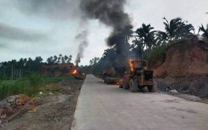 <p><strong>TERRORIST ACT.</strong> Some of the heavy equipment torched by the New People's Army early Thursday (July 29, 2021) in Las Navas, Northern Samar. A private contractor used the equipment to upgrade a road leading to the town's rebel-infested communities. <em>(Photo courtesy of the Philippine National Police)</em></p>