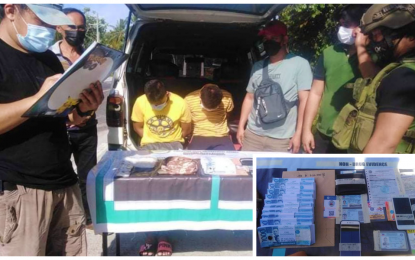 <p><strong>END OF THE LINE.</strong> Agents of the PDEA-BARMM account for the PHP3.4 million worth of suspected shabu (inset) seized during a buy-bust operation in Sultan Mastura, Maguindanao on Friday (July 30, 2021). The suspects (seated) are behind bars awaiting charges for violating the Comprehensive Dangerous Drugs Act of 2002. <em>(Photos courtesy of PDEA-BARMM)</em></p>