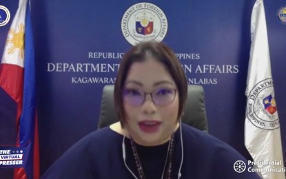 <p><strong>HELPING OVERSEAS FILIPINOS.</strong> Foreign Affairs Undersecretary for Migrant Workers' Affairs Sarah Lou Arriola speaks during a virtual presser on Friday (July 30, 2021). Arriola said the DFA has repatriated 405,769 distressed overseas Filipinos since February 2020 and aims to repatriate 4,210 more in August. <em>(Screengrab from virtual presser)</em></p>