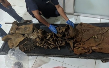 <p><strong>NPA EXECUTION VICTIM.</strong> Authorities are still determining the identity of the remains exhumed by 36IB troopers in Sitio Avelino, Barangay Cabangahan, Cantilan, Surigao del Sur on July 28, 2021. A former rebel said the remains belonged to a civilian who was summarily executed by the New People’s Army after an encounter in Sitio Avelino on May 11, 2021. <em>(Photo courtesy of 36IB)</em></p>