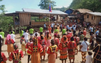 <p><strong>FIRST FLAG RAISING</strong>. Members of the Matigsalug tribe in Marilog, Davao City attend their first flag-raising ceremony that kicked off a two-day for the indigenous people in the area on July 30, 2021. The tribe members sang for the first time the national anthem, Lupang Hinirang, since they were freed from Communist Party of the Philippines’ armed wing New People’s Army. <em>(Photo courtesy of PRO-11)</em></p>