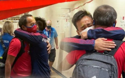<p><strong>A HUG FOR THE MENTOR</strong>. An emotional Nesthy Petecio and coach Nolito Velasco, who hails from Bago City, Negros Occidental, hug each other after the boxer’s silver medal finish in the women’s featherweight event in the Tokyo 2020 Olympics on Tuesday (Aug. 3, 2021). “I dedicate this silver medal to my coach, Coach Boy, for his tireless effort to bring me to where I am now,” the 29-year-old Dabawenya fighter said. <em>(Images courtesy of MVP Sports Foundation Inc.)</em></p>