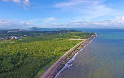 <p><strong>SHORE PROTECTION</strong>. A portion of the Leyte tide embankment project in Tacloban City. Department of Public Works and Highways (DPWH) Secretary Mark Villar on Tuesday (Aug. 3, 2021) assured the substantial completion of the PHP9.62 billion seawall before the end of President Rodrigo Duterte’s term next year.<em> (Photo courtesy of DPWH)</em></p>