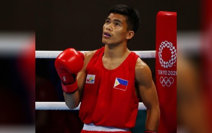 <p>Filipino boxer Carlo Paalam <em>(Photo courtesy of Tokyo 2020 Twitter account)</em></p>