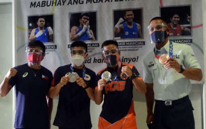 <p>Philippines boxing team in Tokyo Olympics (from left) Irish Magno, Carlo Paalam, Nesthy Petecio, and Eumir Felix Marcial <em>(Contributed photo)</em></p>