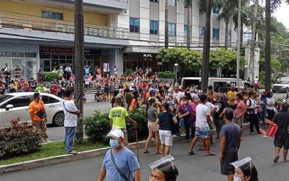 <p><strong>MISINFORMED.</strong> Hopeful vaccinees but without schedules converge outside the Araneta Coliseum in Cubao, Quezon City on Sunday (Aug. 8, 2021). The local government blamed fake news on social media that walk-ins will be accepted at the mega vaccination for the crowd surge. <em>(Photo courtesy of QC Task Force Disiplina)</em></p>