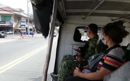 <p><strong>FREE RIDE.</strong> A police vehicle is used to transport authorized persons outside of residence (APORs) in Marikina City in this undated photo. The police and military are offering free rides for APORs in select routes for the entire enhanced community quarantine period in Metro Manila and nearby provinces. <em>(Contributed photo)</em></p>