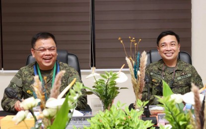 <p><strong>ACCOMPLISHMENT</strong>. AFP Chief of Staff Lt. Gen. Jose C. Faustino Jr., (left) and Northern Luzon Command (Nolcom) chief Lt. Gen. Arnulfo Marcelo B. Burgos Jr. are shown during a command conference at the Nolcom headquarters in Tarlac on Monday (Aug. 9, 2021). Burgos said a total of 575 members of the Communist Party of the Philippines-New People’s Army operating in Northern and Central Luzon have returned to the fold of the law since the start of this year.<em> (Photo courtesy of Nolcom)</em></p>