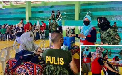 <p><strong>DOING FINE.</strong> Police and soldiers receive their shots against Covid-19 in Maguindanao. More than 60,000 individuals belonging to the A1 to A3 groups have been fully vaccinated.<em> (Photos courtesy of Maguindanao IPHO)</em></p>