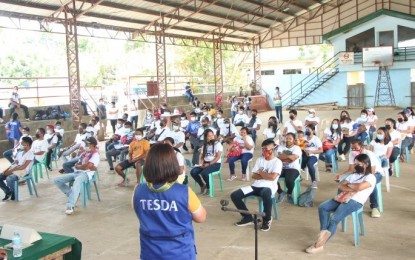 <p><strong>TESDA TRAINING</strong>. The launching activity of the community-based skills training and other livelihood interventions led by the Technical Education and Skills Development Authority in Barangay Codcod, San Carlos City, Negros Occidental on Aug. 5, 2021. Some 63 beneficiaries from three insurgency-cleared villages are attending various training this month. <em>(Photo courtesy of TESDA-Negros Occidental)</em></p>